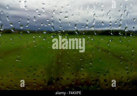 Raindrops on a windows train moving Stock Photo