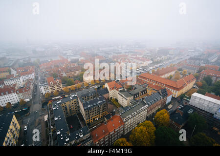 Foggy view from the tower of the Church of Our Saviour, in Christianshavn, Copenhagen, Denmark. Stock Photo