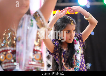 Pretty Young Indian Girl taking part in traditional Indian dance Stock Photo