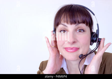 Portrait of beautiful call center operator at work Stock Photo