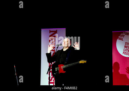 Wilko Johnson performing at the Stoke Newington Literary Festival in Stoke Newington, New Statesman banner behind him Stock Photo