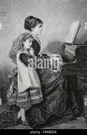 Piano music lesson. Mother and child playing the piano. Engraving. 19th century. Stock Photo