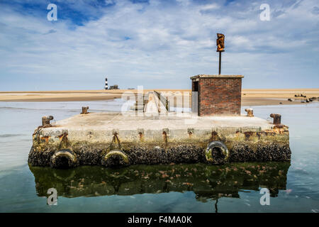 Small stone dock by the Pelican Point Lodge, Walvis Bay, Namibia, Africa Stock Photo