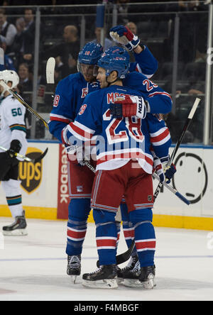 New York, NY, USA. 19th Oct, 2015. New York Rangers left wing VIKTOR STALBERG (25) celebrates a goal with New York Rangers defenseman MARC STAAL (18) and New York Rangers center DOMINIC MOORE (28) in the 3rd period during an NHL hockey game at Madison Square Garden, Monday, Oct. 19, 2015. Credit:  Bryan Smith/ZUMA Wire/Alamy Live News Stock Photo