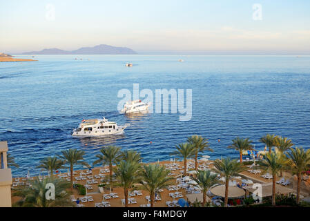 Sunset at Naama Bay, Red Sea and motor yachts, Sharm el Sheikh, Egypt Stock Photo