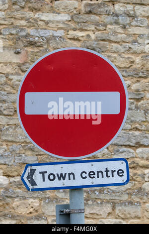 Pointing the way to the town centre via a no entry sign, England, UK Stock Photo