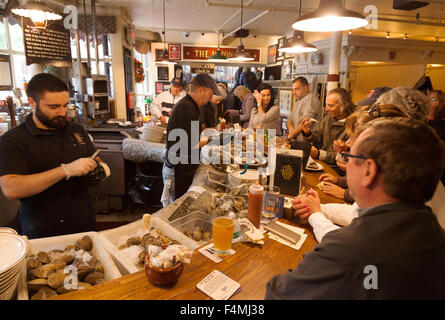 Boston seafood; Customers being served in the Union Oyster House, Boston, Massachusetts USA Stock Photo