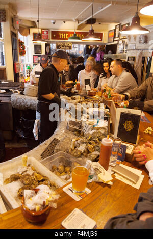 Customers being served in the Union Oyster House, Boston, Massachusetts USA Stock Photo