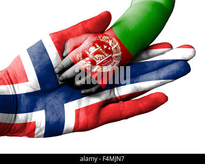 Flag of Norway overlaid the hand of an adult man holding a baby hand with the flag of Afghanistan overprinted Stock Photo