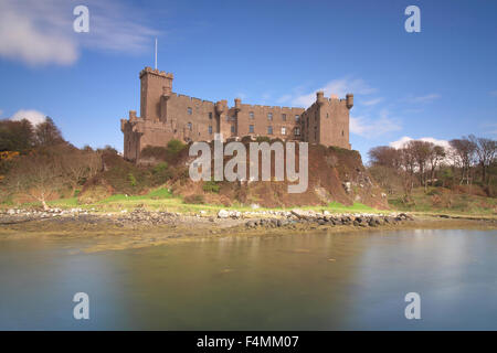 Dunvegan Castle by Loch Dunvegan on a sunny day Stock Photo