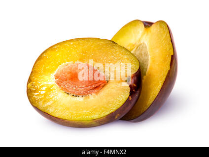 Two halves of violet plum each other isolated on white background Stock Photo