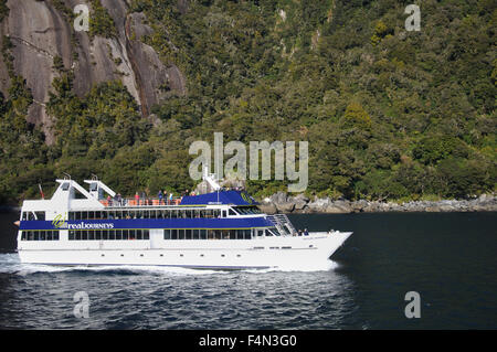 Tourist Launch at Milford Sound, Fiordland, New Zealand Stock Photo