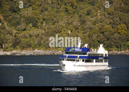 Tourist Launch at Milford Sound, Fiordland, New Zealand Stock Photo