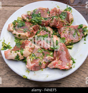 Marinated lamb chops on a plate Stock Photo