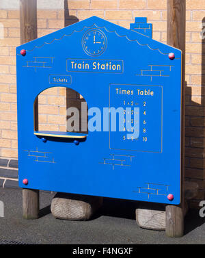 Childrens' play railway station ticket office playground equipment on the station platform at the Ribble Steam Railway, Preston. Stock Photo