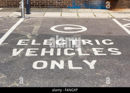 Electric car charging point at Irlam and Cadishead Lesiure Centre, Salford, Greater Manchester, operated by GMEV. Stock Photo