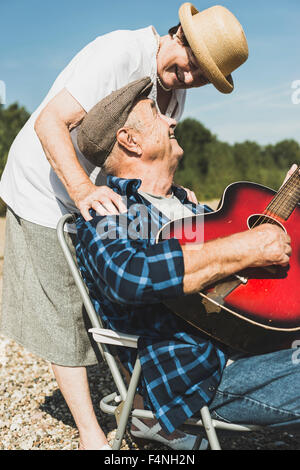 Happy senior couple with guitar Stock Photo