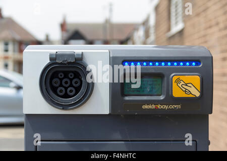 Electric car charging point at Irlam and Cadishead Lesiure Centre, Salford, Greater Manchester, operated by GMEV. Stock Photo