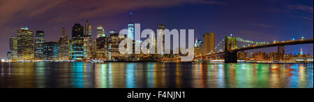 Manhattan skyline at night, New York City panoramic picture, USA. Stock Photo