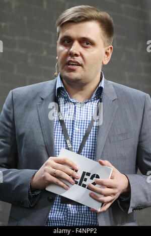 Moscow, Russia. 21st Oct, 2015. Roman Volodin, head of the Marketing and Product Development Department at TELE2, speaks during a press conference on the launch of the TELE2 cell phone provider in Moscow. © Vyacheslav Prokofyev/TASS/Alamy Live News