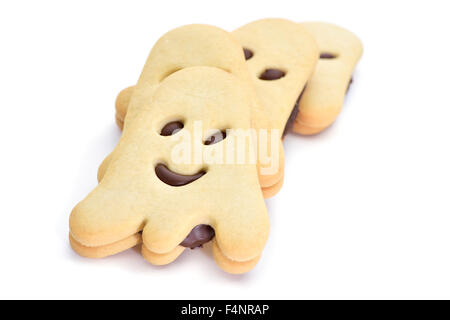some ghost-shaped cookies on a white background Stock Photo