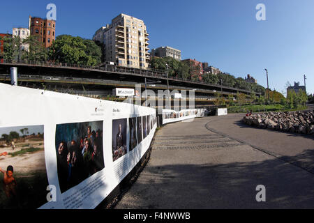 Section of 'the fence'' part of the Photoville Photography Exposition Brooklyn Bridge Park Brooklyn New York City Stock Photo