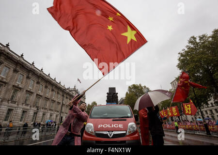 London, UK. 21st October, 2015. Pro-Chinese government supporters wait for President Xi Jinping to arrive at Downing Street on day two of his official state visit in UK Credit:  Guy Corbishley/Alamy Live News Stock Photo