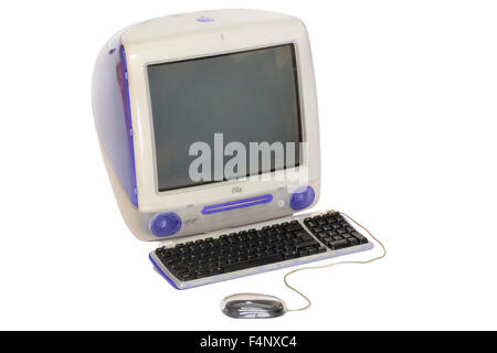 Original / old Apple iMac personal desk top computer Power PC G3 model with CRT type screen, late 1990's model running Mac OS 9. Stock Photo