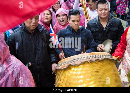 Whitehall, London, October 21st 2015. Hundreds of Chinese supporters waving banners and wearing 'I Love China' T-shirts apparently supplied by the Chinese embassy, face Human rights, Tibetan and Falun Gong protesters as they await the arrival at Downing Street of President Xi Jinpeng. Credit:  Paul Davey/Alamy Live News Stock Photo