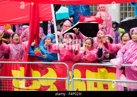 Whitehall, London, October 21st 2015. Hundreds of Chinese supporters waving banners and wearing 'I Love China' T-shirts apparently supplied by the Chinese embassy, face Human rights, Tibetan and Falun Gong protesters as they await the arrival at Downing Street of President Xi Jinpeng. Credit:  Paul Davey/Alamy Live News Stock Photo