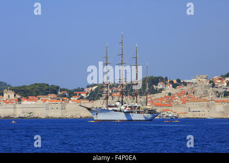 The 4-mast bark Sea Cloud (the most romantic sailing ship afloat) for anchor in the bay outside the beautiful medieval Old Town of Dubrovnik, Croatia Stock Photo