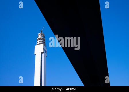 The BT Tower in Birmingham, UK, framed by a footbridge in the foreground Stock Photo