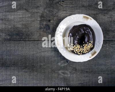 Donuts on wooden background. Retro style photo. 17th Oct, 2015. © Igor Goiovniov/ZUMA Wire/Ģ����ý Live News Stock Photo