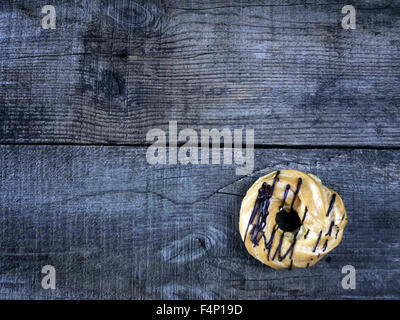 Donuts on wooden background. Retro style photo. 17th Oct, 2015. © Igor Goiovniov/ZUMA Wire/Ģ����ý Live News Stock Photo
