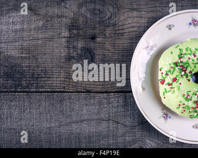 Donuts on wooden background. Retro style photo. 17th Oct, 2015. © Igor Goiovniov/ZUMA Wire/Ģ����ý Live News Stock Photo