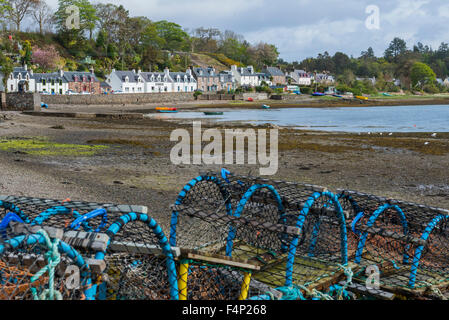 crab and lobster traps in different sizes and colors in the town of Plokton in the Scottish Highlands. Stock Photo