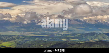 Panoramic view of High Tatras in Slovakia from summit of Kralova hola mountain Stock Photo