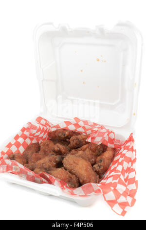 Take out thai chilli chicken wings in package on a white background Stock Photo