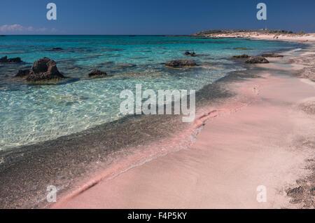 Beaches in Elafonisi, Crete island. have the particularity to be colored pink because of the coral fragments accumulated on the Stock Photo
