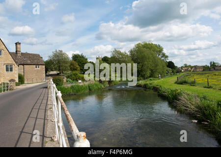 The Mill House next to the bridge over the River Coln in Fairford, Gloucestershire, UK Stock Photo