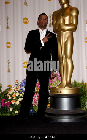 October 21, 2015 - File - CHRIS ROCK is returning to host next year's Oscars ceremony, its producers announced today. The actor and comedian previously hosted the 77th annual Academy Awards in 2005, when the reception to his opening monologue and some controversial jokes was mixed. The 88th Oscars will be held on Sunday 28 February, 2016. Pictured: Feb. 27, 2005 - Hollywood - Chris Rock hosts the 77th Annual Academy Awards. (Credit Image: Paul Fenton/ZUMAPRESS.com) Stock Photo