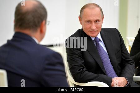 Russian President Vladimir Putin meets with Prince Albert II of Monaco following the opening ceremony of the 1st World Olympians Forum October 21, 2015 in Moscow, Russia. Stock Photo