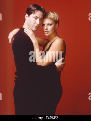 KEANU REEVES, CHARLIZE THERON, THE DEVIL'S ADVOCATE, 1997 Stock Photo