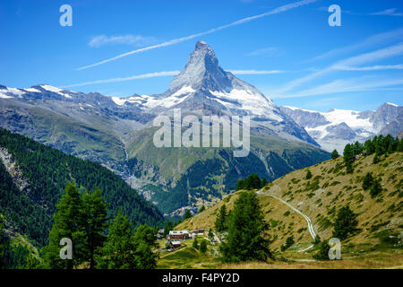 Hiking trails zig-zag through to Matterhorn peak. July, 2015. Matterhorn, Switzerland. Stock Photo