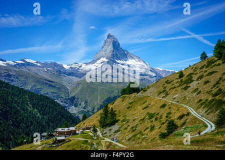 Hiking trails criss cross through to Matterhorn peak. July, 2105. Matterhorn, Switzerland. Stock Photo