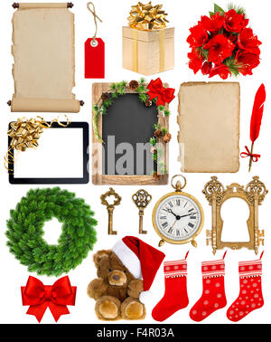 Christmas decoration, ornaments and gifts. Old book page, paper, scroll, wreath, blackboard, flowers isolated on white backgroun Stock Photo