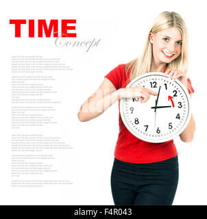 Young woman holding a clock. Time management concept. Winter time (Daylight Saving Time) Stock Photo