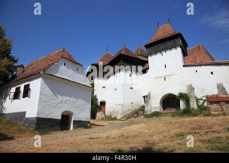 A World Heritage Site by UNESCO: Viscri fortified church, Transylvania, Romania. The first documentation of Viscri is a record o Stock Photo