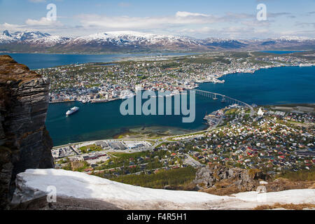 Norway, Troms, Nord-Troms, Tromso, city, port, aerial, snow, bridge, landscape, sea, mountains, panorama Stock Photo