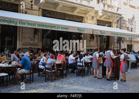 Local Carul cu Bere, beer wagon, in the Strada Lipscani, Leipziger Strasse, the old commercial district, Bucharest, Romania Stock Photo